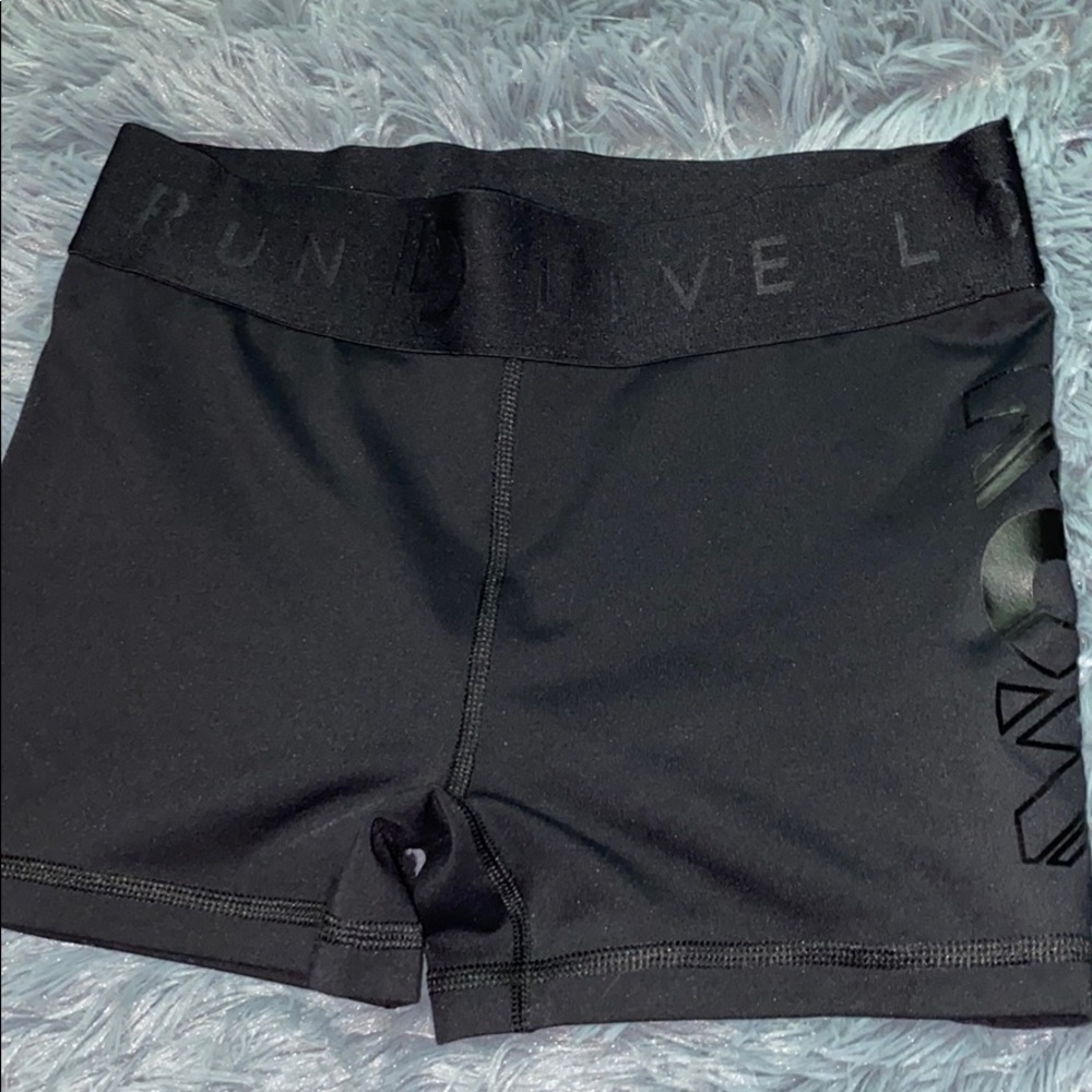 Spandex that say RUN in black
